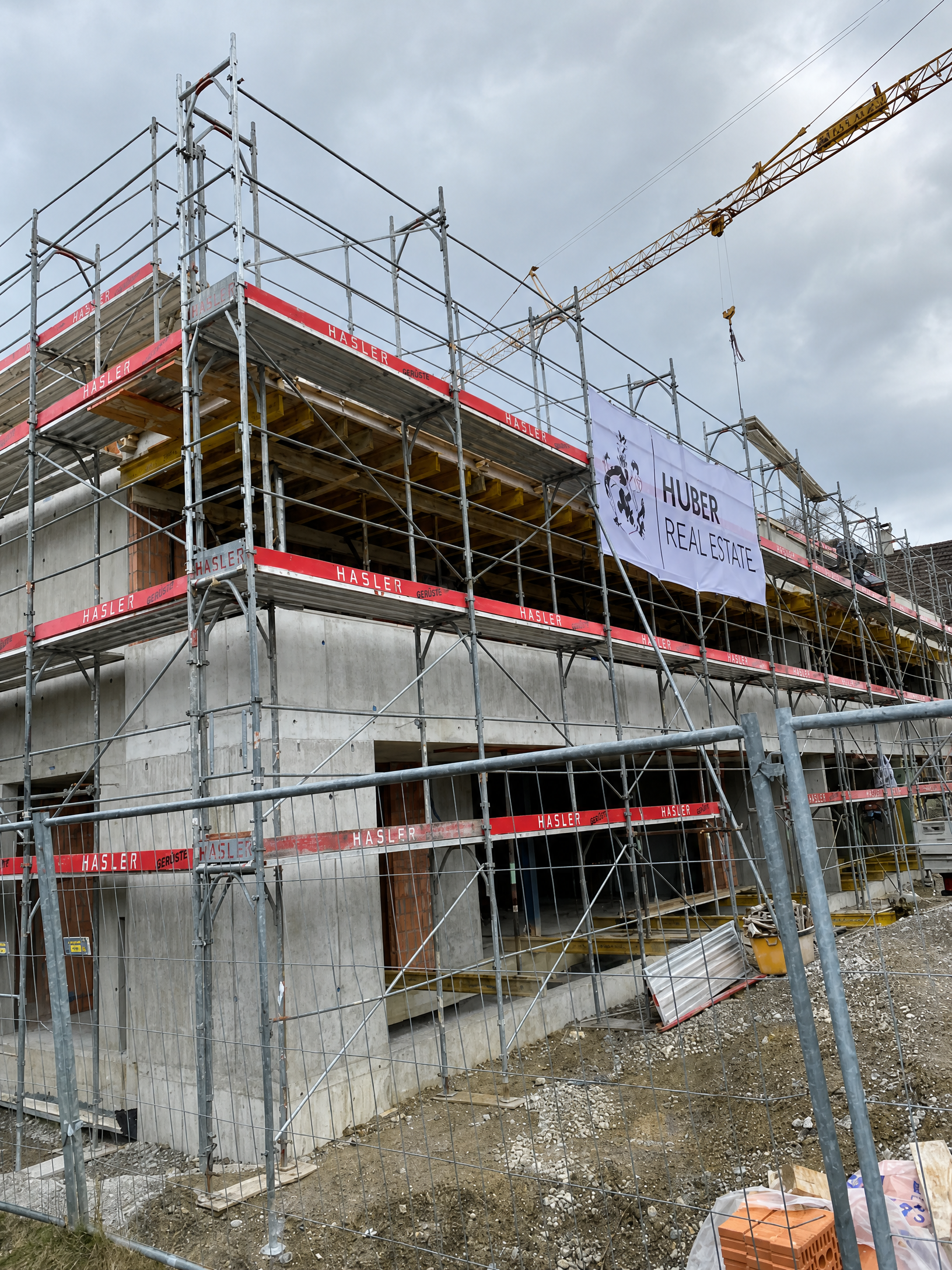HUBER REAL ESTATE – Immobilienentwicklung auf der Baustelle